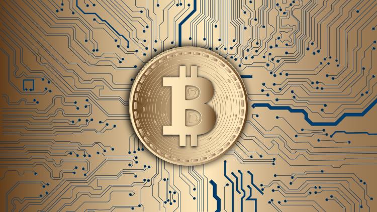 Auf dem Bild ist das Symbol für Bitcoin zu sehen.